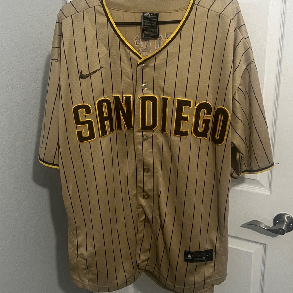 Nike Tan Jersey with Black Stripes and Yellow Trim